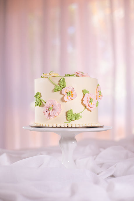Buttercream cake with piped buttercream flowers and leaves - Sweet Passion Cakes Aus